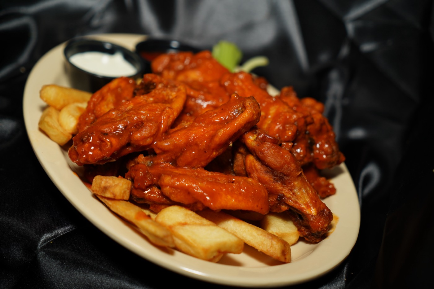 A platter of wings and fries