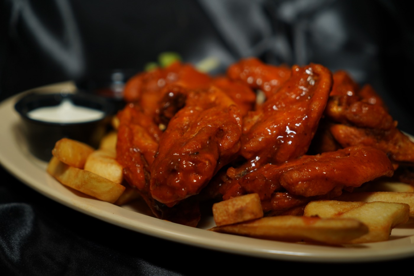 Wings with fries and dipping sauce